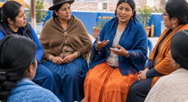 Mujeres de la comunidad reunidas en círculo